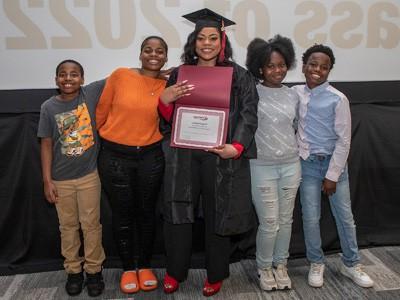 Graduate with her kids